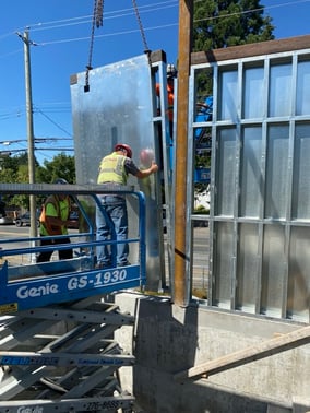 DRYSTAR installer working from a lift on exterior wall framing