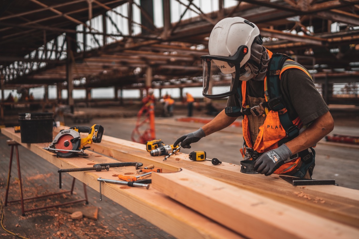 Construction worker on site; construction industry trends concept